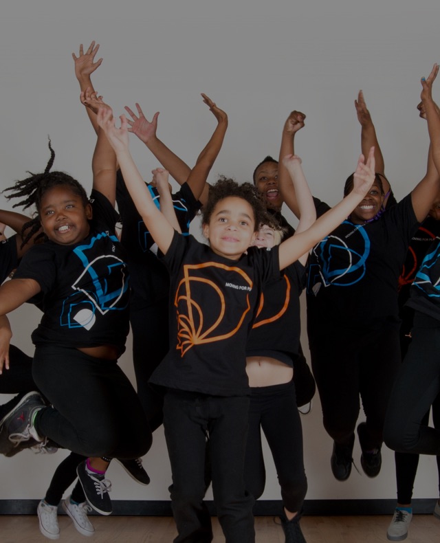 Picture of young Destiny Arts kids jumping in the air with joy